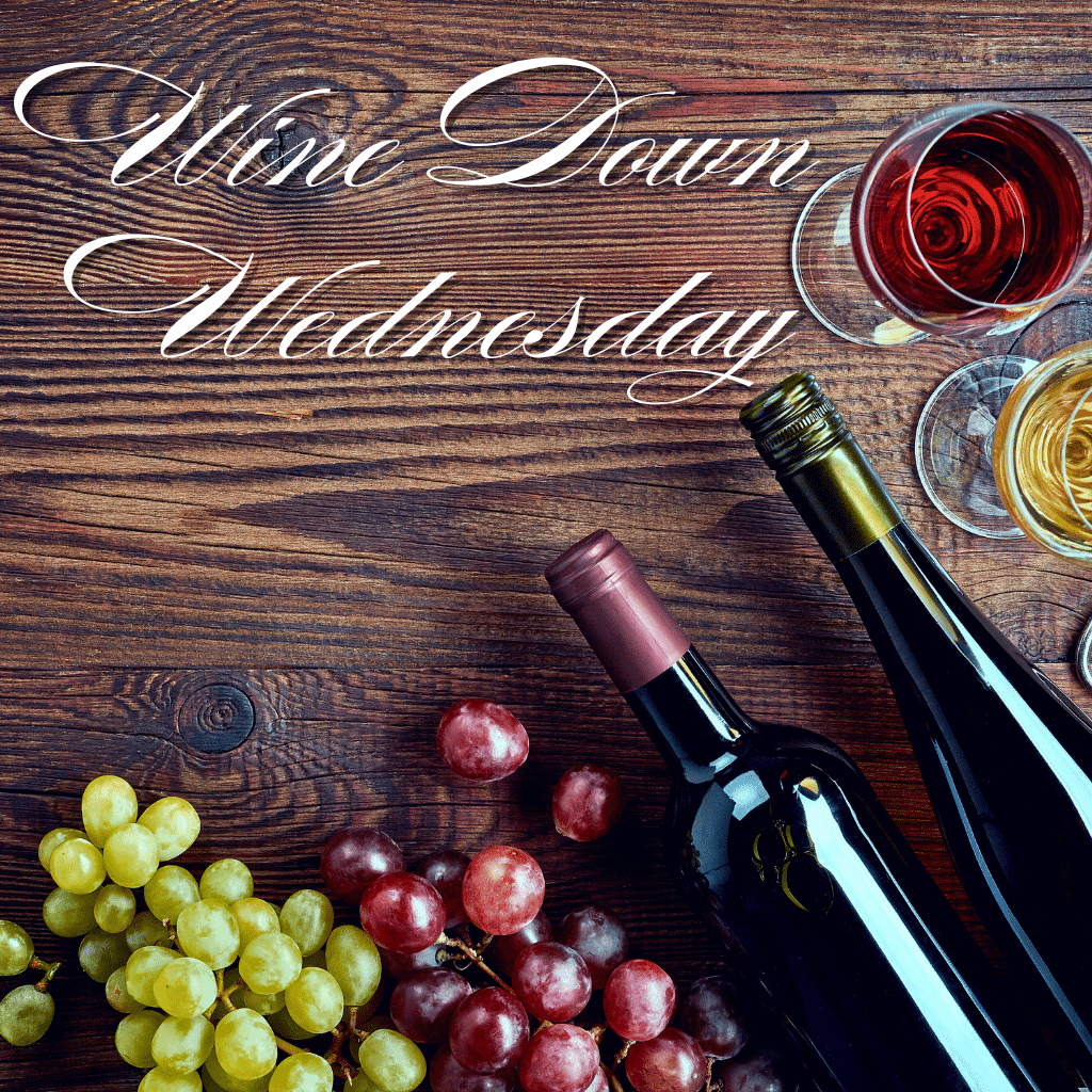 a group of wine glasses and bottles of wine