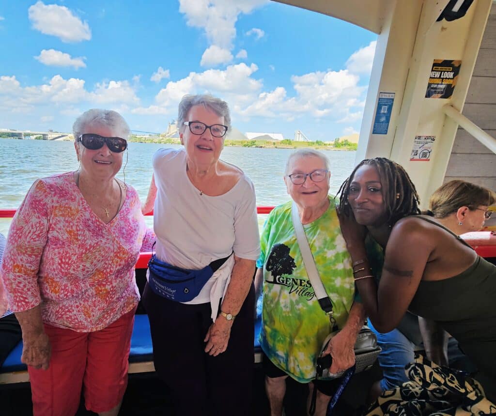 Seniors enjoying sunny weather on Sandpiper Cruise with Genesis Village senior living community